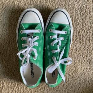 Green converse with a Boston B